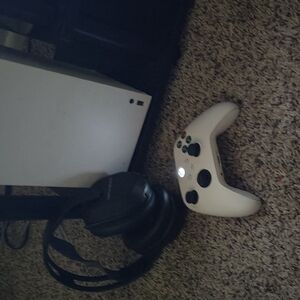 White Gaming Console with Controller and Headphones
